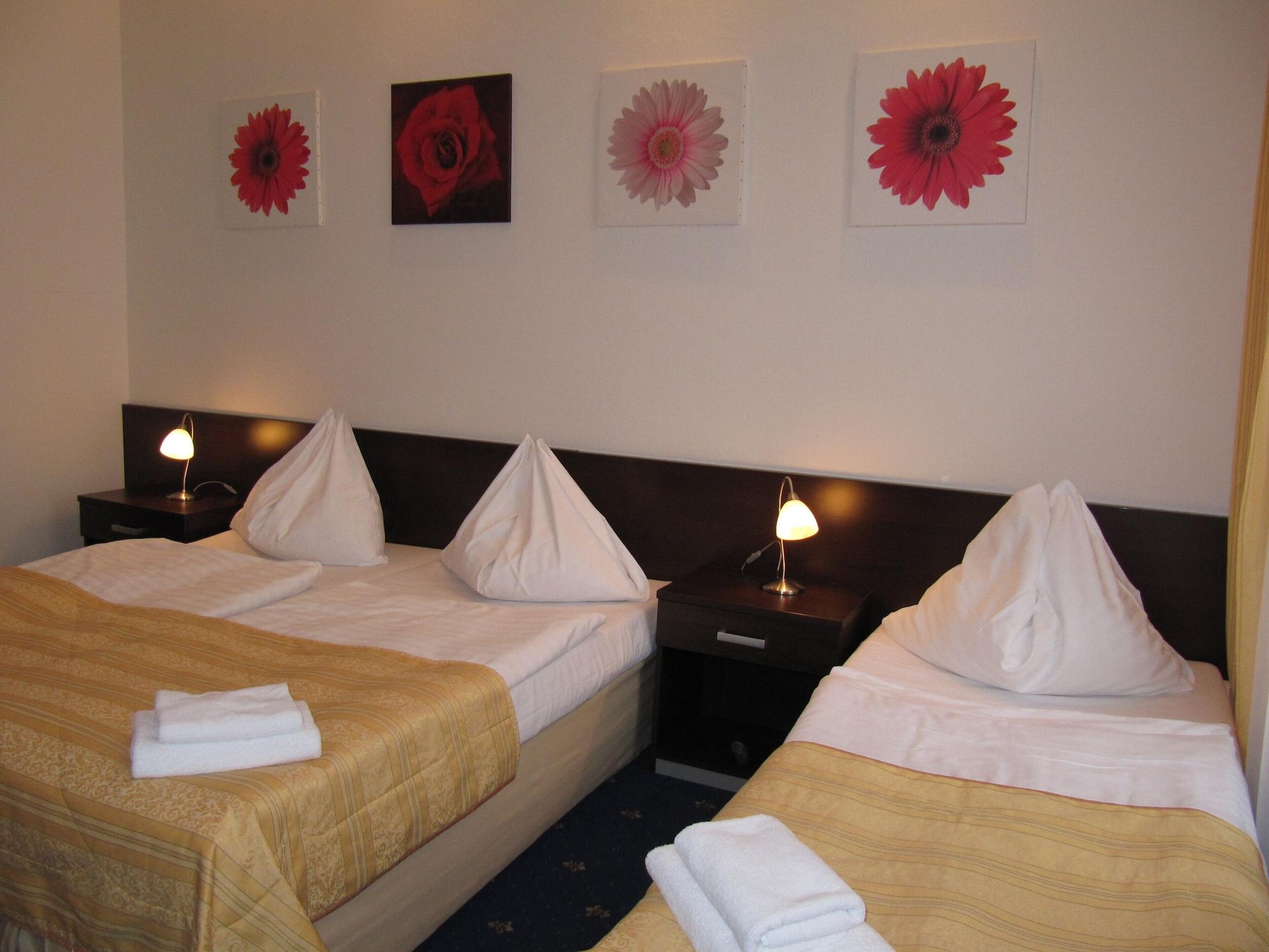 Dreibettzimmer
