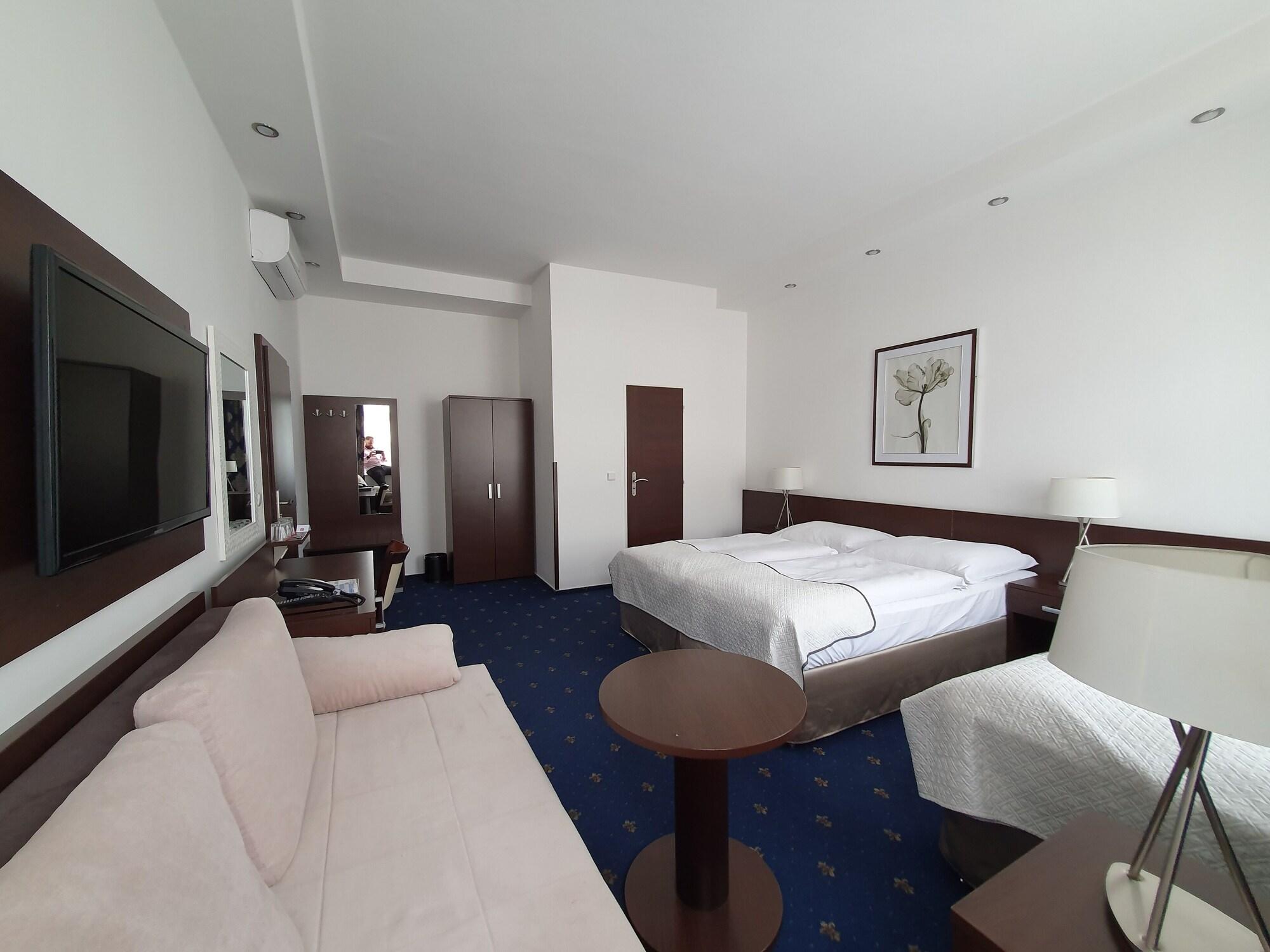 Deluxe Dreibettzimmer
