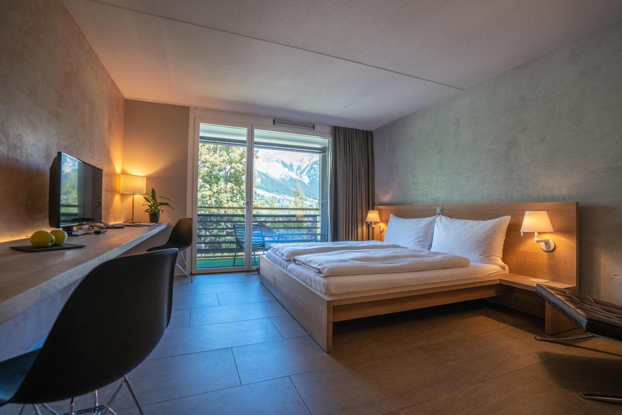 Superior Doppelzimmer mit Balkon und Zugang zu Innenpool und Sauna