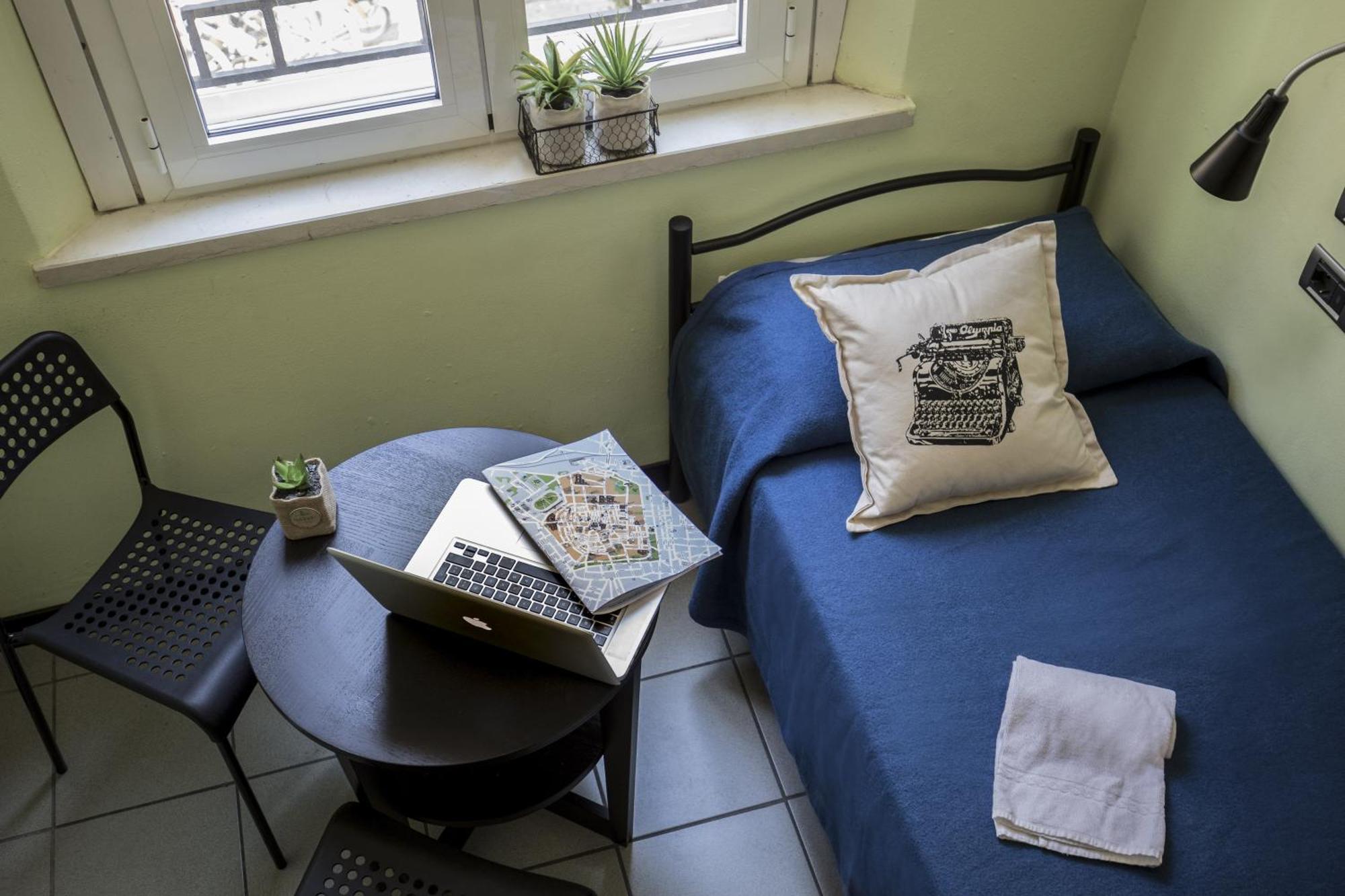 Bett im Frauenschlafsaal mit 3 Betten und eigenem externen Bad