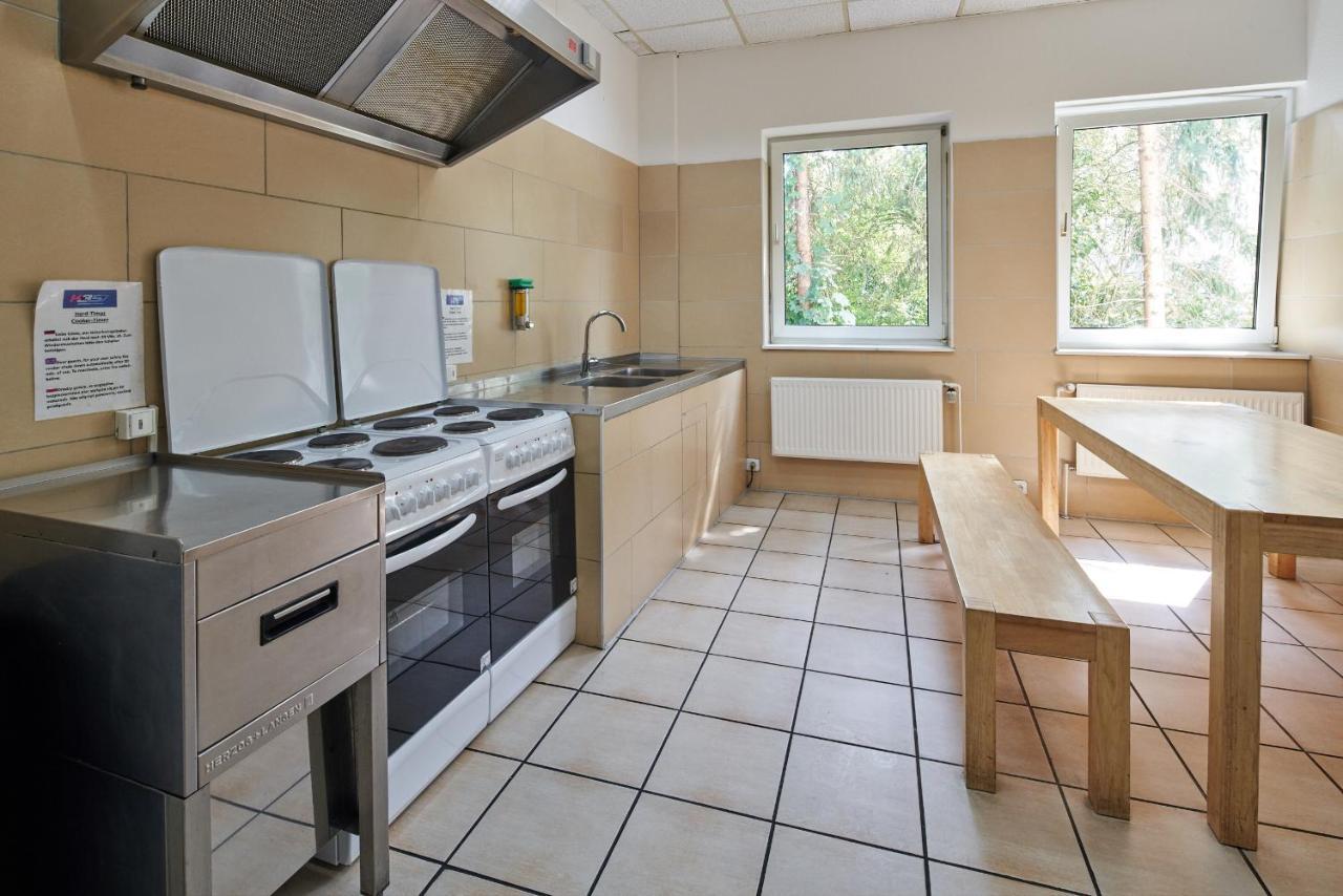Eight-bed room with shared bathroom