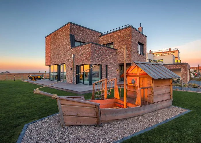Strandhotel: Villa King Erste Lage, Dachterrasse, Meerblick, Carport, Kamin, Sauna, Terrasse, Aussenrolllaeden